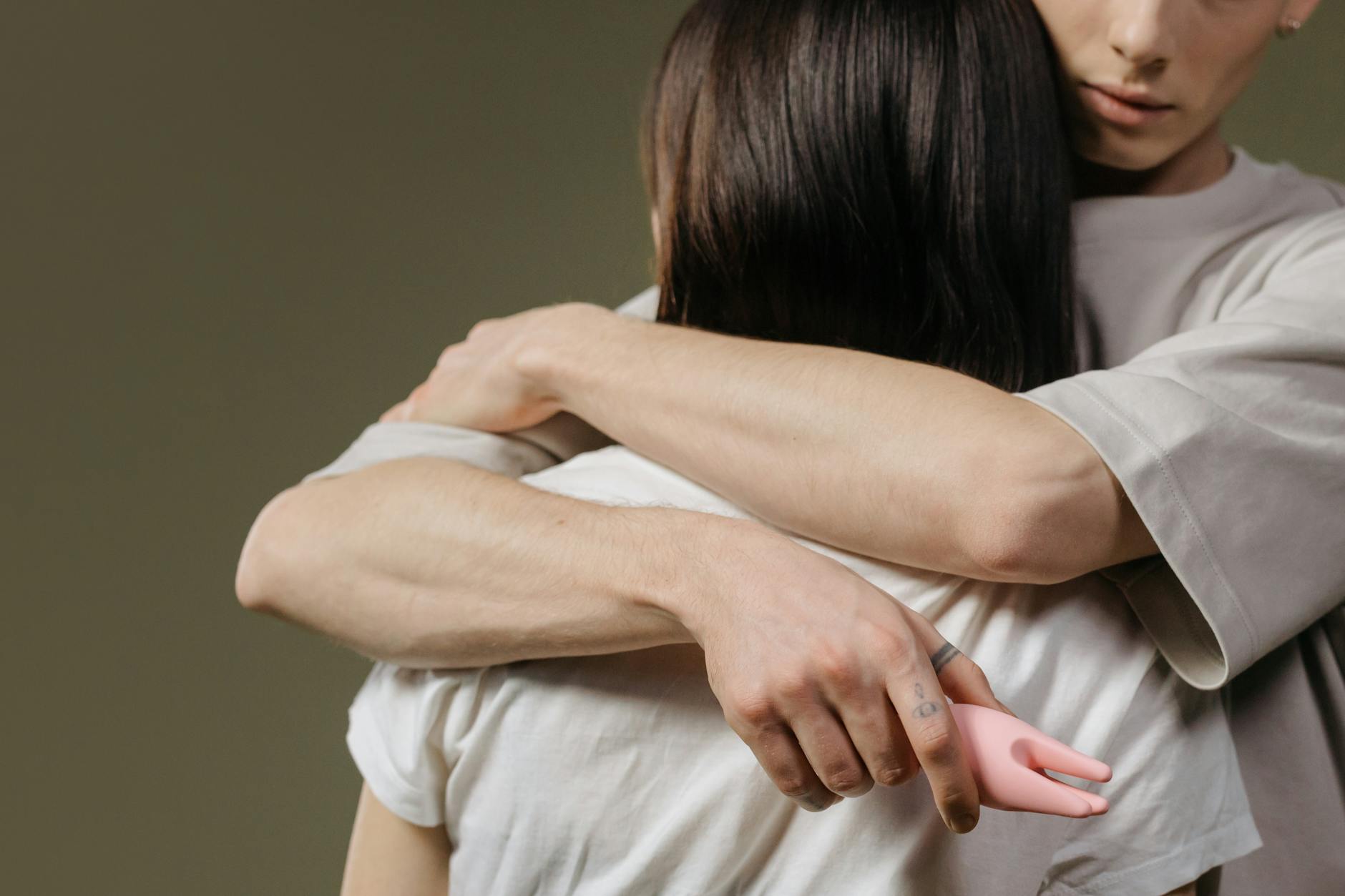 A couple embracing, highlighting intimacy and connection.